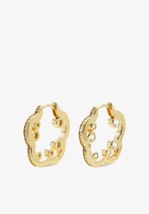 Boucles d'oreilles en or avec un design en forme de vagues, agrémentées de pierres claires et d'une rangée latérale de petits accents scintillants.