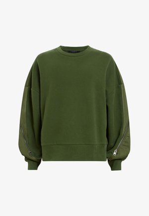Sweatshirt vert surdimensionné avec des manches longues et bouffantes, et des accents zippés le long des épaules. Fabriqué en matériau doux et texturé.