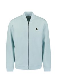 Lichtblauwe bomberjack gemaakt van zachte stof, met een ritssluiting aan de voorkant en een hexagonaal logo op de linkerborst. Ribgebreide manchetten en zoom.