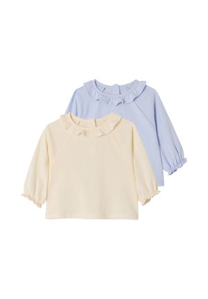 Two long-sleeve toddler tops with ruffled collars and elastic cuffs, one in cream and one in light blue, on a white background.