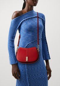 Tommy Hilfiger HERITAGE SADDLE BAG - Rankinė - dark magma