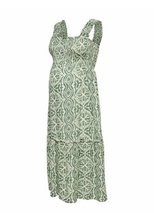 Varrukateta raseduskleit rohelise ja valge geomeetrilise mustriga, impeeriumi vöökoht ja volditud astmeline seelik.