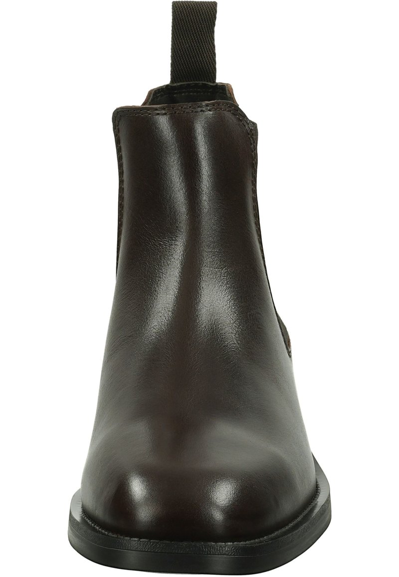 Bottines en cuir brun avec une texture lisse, des panneaux élastiques sur les côtés et une languette à l'arrière. Semelle en caoutchouc noire robuste.