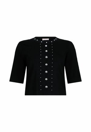 Melns īss piedurkņu tops ar apaļu kakla izgriezumu, priekšpusē un pie kakla izgriezuma ir divas vertikālas rindas ar lielām metāla pogām un maziem kniedēm.