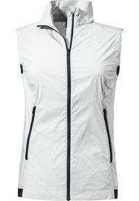 Gilet léger sans manches en tissu blanc brillant avec un col haut, fermeture éclair à l'avant et deux poches latérales. Accents navy au niveau des emmanchures.