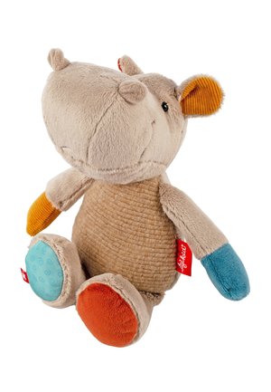 Plush hippopotamus toy with beige body, orange and blue feet, orange inner ears, and a textured belly, sitting upright against white background.