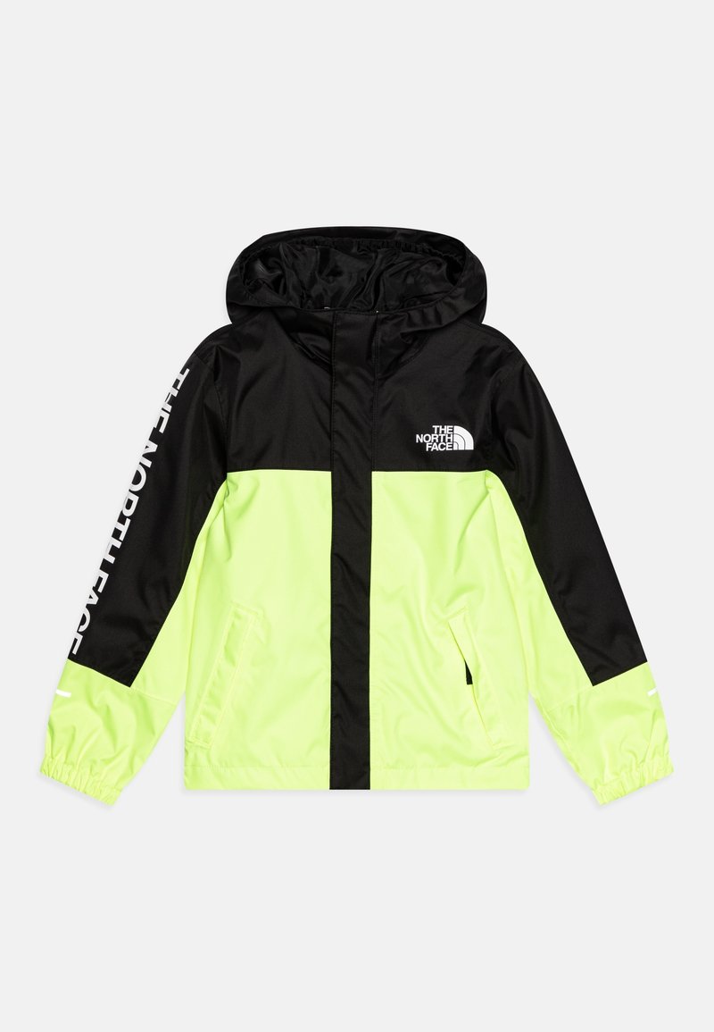 Ljusgul och svart vindjacka med huva, försedd med The North Face-logotyp och elastiska ärmslut. Tillverkad av lätt, vattentåligt material.