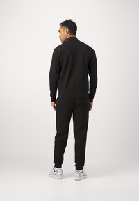 EA7 Emporio Armani TRAIN PREMIUSHIELD TRACK SUIT - Trenirka - black