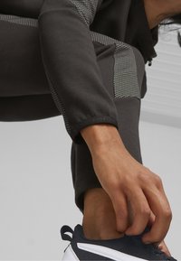 Puma Träningsbyxor - black