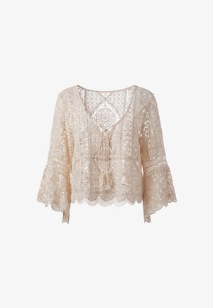 Beige blondetop med blomster- og geometriske mønstre, klokkeærmer, V-hals og frynsebindedetalje foran.