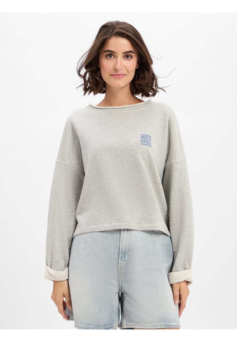Gray sweatshirt with a round neckline and long sleeves featuring rolled cuffs. Small blue "American Vintage" label on the chest. Casual fit.