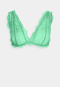 Bralette de renda em verde menta com bordas onduladas, decote em V profundo e alças finas. Material leve e semi-transparente com padrão floral.
