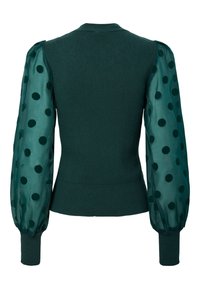 Haut en maille vert foncé avec des manches bouffantes transparentes ornées de gros pois et des poignets côtelés ajustés, vu de dos.