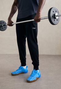 ICANIWILL ACTIVITY PANTS MEN - Treniņtērpa apakšdaļas - black