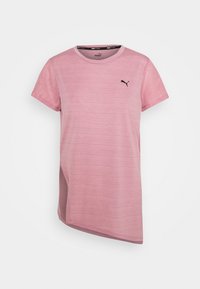 Light pink Puma short-sleeve sports shirt with perforated sleeves and a small black Puma logo on the left chest.