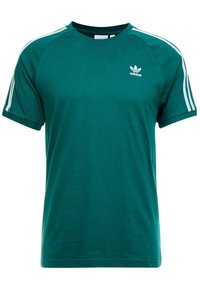 Green cotton t-shirt with short raglan sleeves, featuring white three-stripe accents and a small white logo on the chest.
