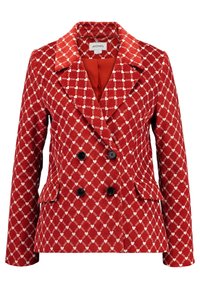 Röd dubbelknäppt jacka med ett diamantmönster i vitt. Har slagkragar, två framfickor och svarta knappar. Texturerat tyg.