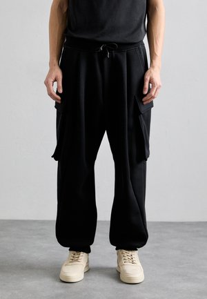 BALOON PANT - Cargo trousers - black