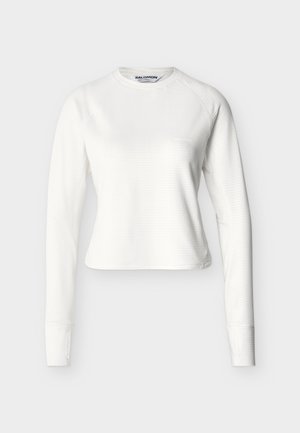 Λευκό μακρυμάνικο μπλουζάκι με στρογγυλή λαιμόκοψη, διακριτική υφή, εφαρμοστή σιλουέτα και μικρό λογότυπο Salomon στο στήθος.