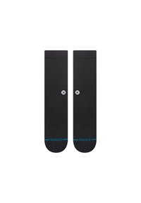 Black socks with a smooth texture, featuring a small white logo and blue accents at the top and bottom. Classic knee-high design.