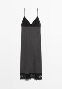 Black slip dress with thin straps, lace trim at the bodice and hem, smooth fabric, below knee length, features a subtle sheen.