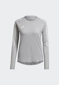 Hellgraues langärmliges Sportshirt mit weißen drei Streifen an den Schultern und einem runden Ausschnitt. Glattes, feuchtigkeitsableitendes Material.
