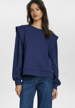 Navy blue sweatshirt with unique shoulder pads, long puffed sleeves, crew neck, and a relaxed fit. Made from soft cotton fabric.