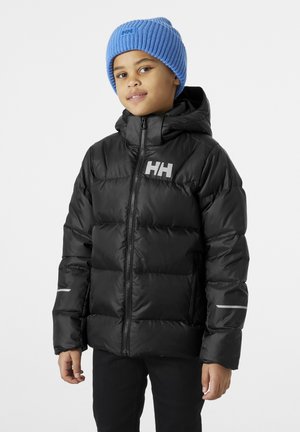 Black puffer jacket with a zip closure and hood, featuring a reflective logo and accents. Paired with a light blue knit beanie.