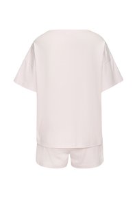 Light pink short-sleeve t-shirt with a wide neckline and relaxed fit, paired with matching shorts. Soft cotton material, smooth texture.