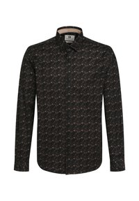 Camisa de manga larga en negro con un patrón geométrico en tonos de marrón, cuello y cierre frontal con botones; la tela parece suave y ligera.