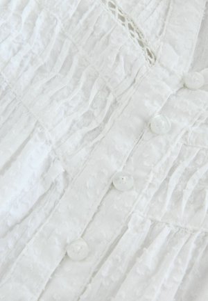 Next Pluus - white