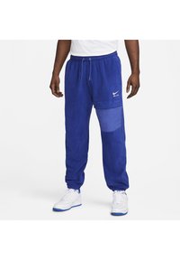 Nike Sportswear AIR WINTER PANT - Cargo trousers - deep royal blue/white