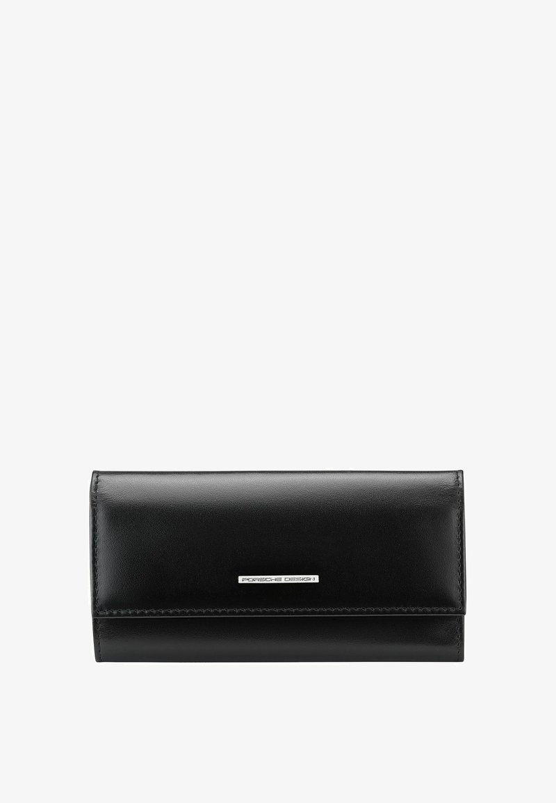 Portefeuille en cuir noir avec fermeture à rabat et plaque logo argentée "Porsche Design" centrée à l'avant.