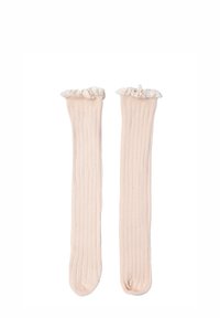 Calze a costine alte fino al ginocchio in morbido tessuto di un delicato rosa chiaro, con un bordo bianco arricciato sulla parte superiore. Texture liscia, forma allungata e righe uniformi.