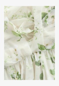 Unselected, sage green floral print