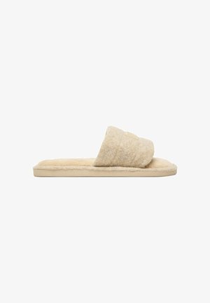 Pantofole beige con punta aperta, suola imbottita e ampia fascia pelosa, progettate per il comfort e il calore indoor.