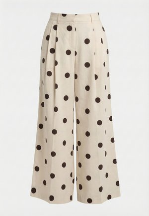 Pantaloni beige a gamba larga con grandi pois neri, davanti plissettati e passanti per cintura.