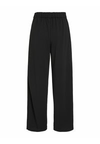 Pantalons larges noirs avec une taille élastique, en tissu léger, dotés d'une texture lisse et sans embellissements supplémentaires.