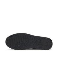 Black shoe sole with textured grip and "HUGO" logo embossed across the bottom, photographed on a white background.