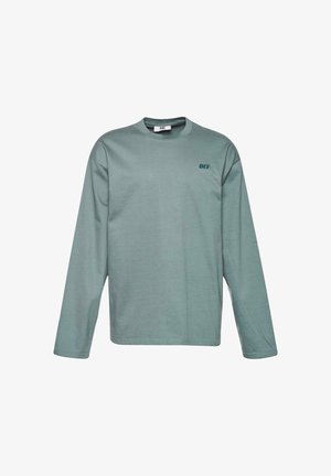 Long-sleeve shirt in muted green, made of cotton. Features round neckline and small dark green logo “DEF” on the left chest area.
