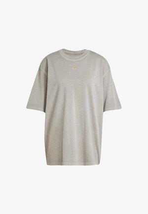 Locker geschnittenes graues T-Shirt aus weichem Stoff mit Rundhalsausschnitt und kurzen Ärmeln. Kleines goldfarbenes Logo-Detail auf der Brust.