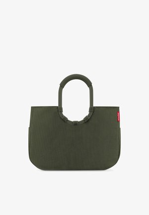 Sac cabas en tissu côtelé vert olive avec poignées supérieures arrondies et petite étiquette de marque rouge sur le côté.