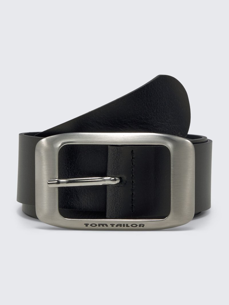 Black leather belt with a wide, smooth texture. Features a rectangular metallic buckle with a silver finish, embossed with "TOM TAILOR."