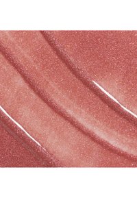 Liquide or rose scintillant avec une texture lisse et brillante et de fines particules de paillettes reflétant la lumière sur toute la surface.