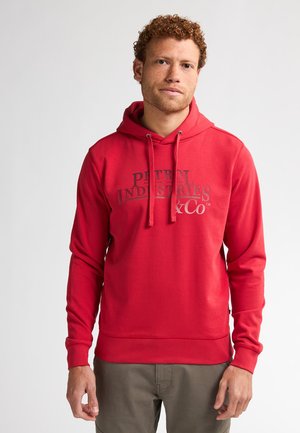 Sudadera roja con capucha, que presenta un bolsillo canguro frontal, capucha ajustable con cordón, y una gran impresión del logo en gris. Tela suave y puños acanalados.