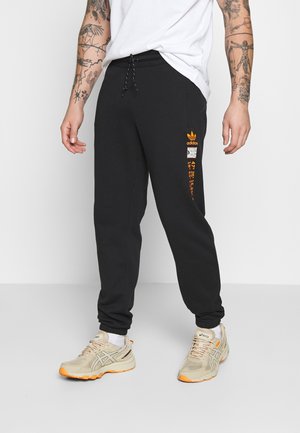 LOGO - Pantaloni sportivi - black