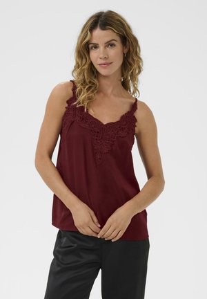 Burgunderfarbener Camisole mit Spitzenverzierungen am Ausschnitt und verstellbaren Spaghettiträgern, aus glattem, leichtem Stoff.