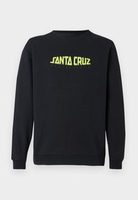 Černá mikina s dlouhými rukávy, kulatým výstřihem a neonově žlutým logem "SANTA CRUZ" potisknutým na přední straně. Hladká textura, volný střih.