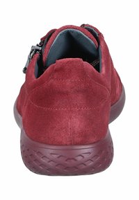 Red suede ankle sneakers with a textured rubber sole and a zip closure on the side. Smooth interior lining visible from the back.