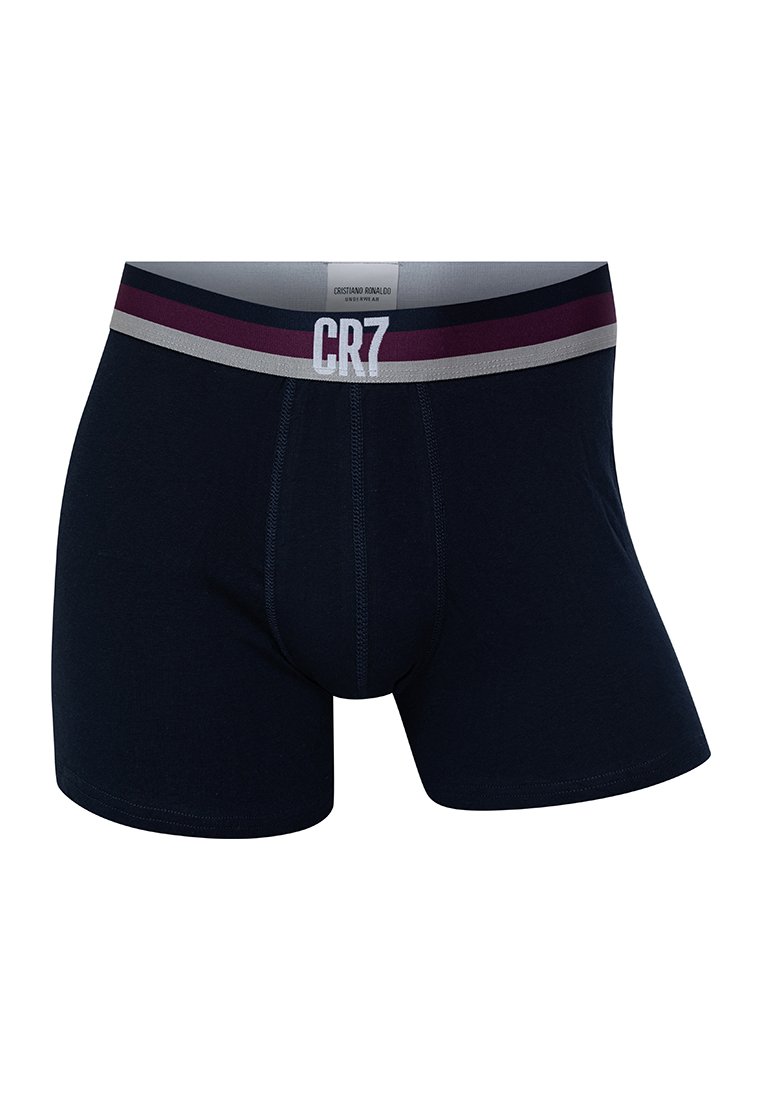 Bañadores boxer de color azul navy con una cinturilla elástica en gris y burdeos que muestra "CR7". Material de algodón suave con un ajuste ceñido.